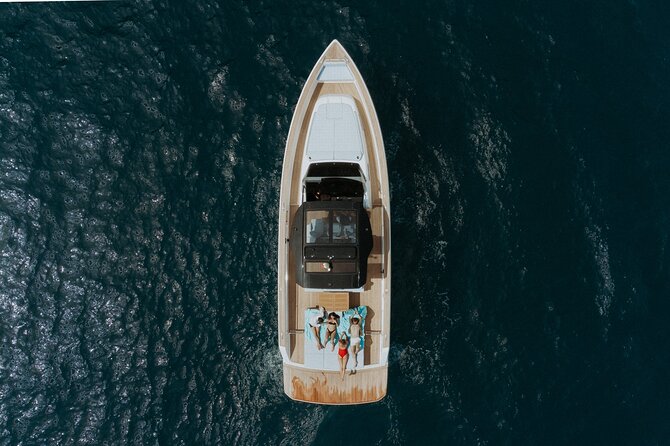 Capri Luxury Private Boat Tour from Capri or Napoli - Exploring Capris Coastal Grottoes and Coves