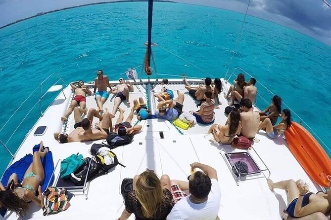 Catamaran Tour to Isla Mujeres from Cancún with Bar and Lunch - Board a Catamaran Over the Caribbean Sea to Isla Mujeres