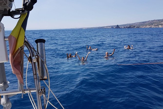 Catania Sail, spritz and fun at sunset - Exploring the I Faraglioni Di Aci Trezza