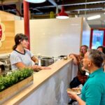 Cincinnati Walking Food Tour With Secret Food Tours - The Banks: Riverfront Development and Iconic Landmarks