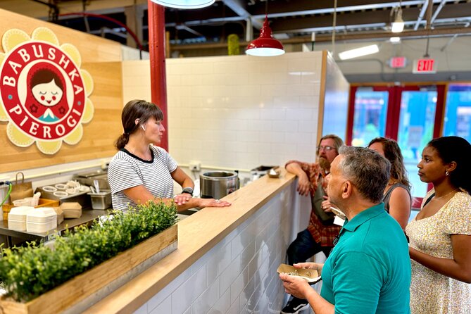 Cincinnati Walking Food Tour With Secret Food Tours - The Banks: Riverfront Development and Iconic Landmarks