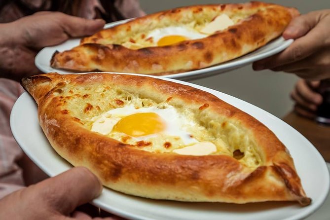 Cook True Ajarian Khachapuri and Khinkali in Highlanders Style - Starting Point: The Meeting at Chakandrila Cafe