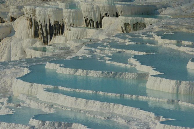 Daily Guided Pamukkale Tour included Pick Up from Denizli Airport - A Colorful Stop at Karahayit Hot Springs