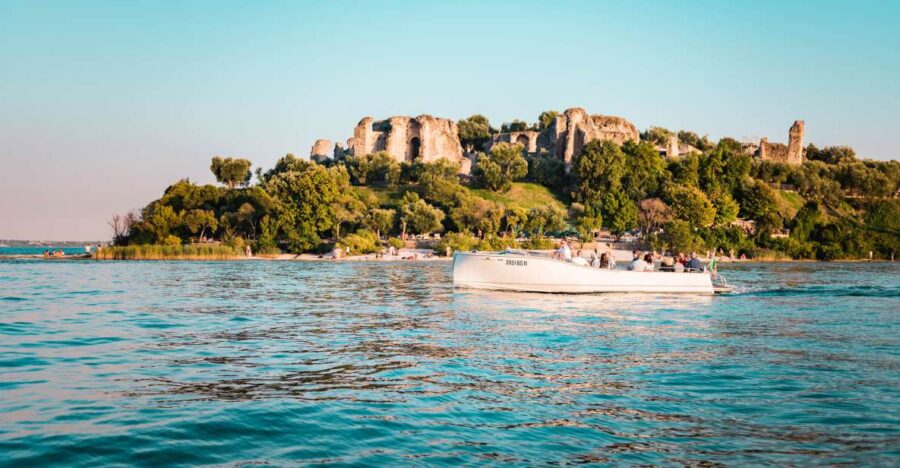 Desenzano del Garda: Sunset Boat Trip at Sunset with Drink - The Exact Meeting Point at Desenzano Harbor