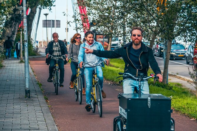 Discover Rotterdam: Classic Highlights Bike Tour with a Local - Crossing the Erasmus Bridge and WWII Memorial Insights