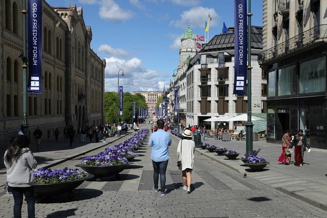 Downtown Oslo: Self-Guided Highlights and History Audio Tour - Visiting Aker Brygge: A Modern Waterfront Shopping Hub