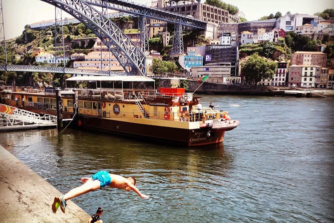 Eat & Tell Porto's Tale: The historical tour that goes through your stomach! - Walking Across the Luis I Bridge to Taste Port Wine