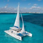 Enjoy From Playa del Carmen Isla Mujeres Catamaran Food and Bar - Departure and Meeting Point at Coco Bongo