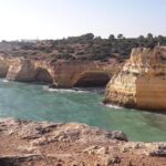 Enjoy The Algarvian Wine Taste & Coast Line Private Van Tour - Walking Along Albufeira’s Coastline to Praia dos Arrifes