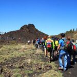 ETNA & WINE, TAORMINA TOUR FD from CATANIA (GUIDE and LUNCH Included) - Visiting the Volcanic Cave with Safety Equipment