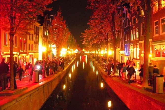 Exclusive Amsterdam Red Light District tour with a drink - The Red Light District (De Wallen): A Walk Through History