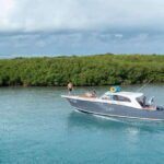 Exclusive Isla Mujeres and Cancun Private Yacht Tour - Exploring Isla Mujeres Playa Norte from the Yacht