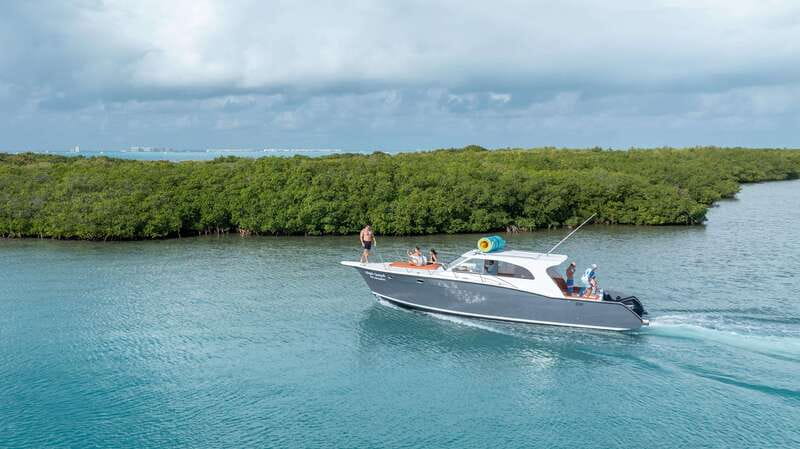 Exclusive Isla Mujeres and Cancun Private Yacht Tour - Exploring Isla Mujeres Playa Norte from the Yacht