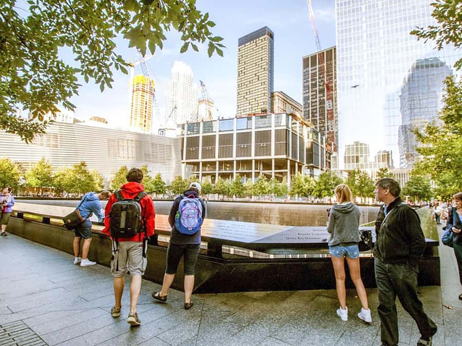 Explore NYC's Finance District, 9/11 Memorial & Liberty Icon - The Power of Reflection at the 9/11 Memorial