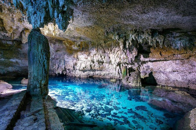 Explore the Tulum ruins, incredible cenotes and a famous sculpture. - Exploring the Tulum Archaeological Site