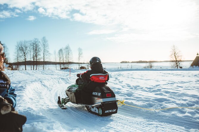Family Snowmobiling in Rovaniemi, Apukka Resort - Starting Point at Apukka Resort Adventures in Rovaniemi