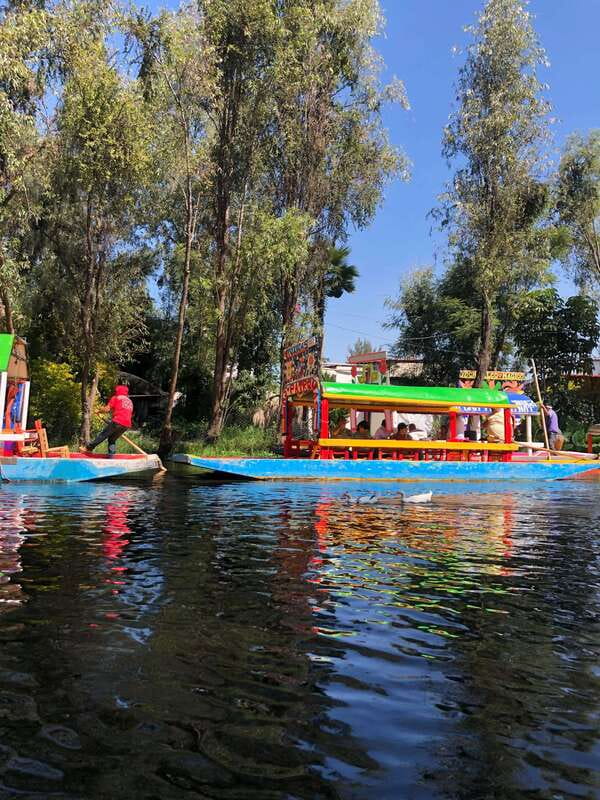 "Floating Party in Xochimilco: Canals, Tequila, and Tradition" - Starting Point and Meeting Details in Caltongo