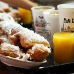 French Quarter History Tour with Cafe Du Monde - Exploring the French Quarters Signature Architecture and Courtyards