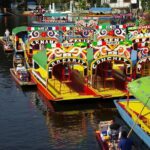 Frida Kahlo Xochimilco and University City - Navigating the Canals of Xochimilco in a Traditional Trajinera
