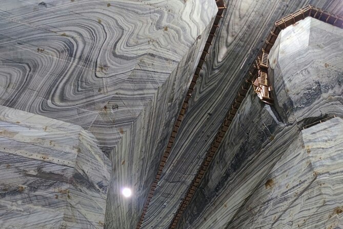 From Bucharest: Largest Salt Mine in Europe and Peles Castle - Descend into the Depths at Unirea Salt Mine