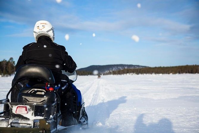From Ivalo: Ice Fishing Safari to Lake Inari, reindeers & lunch - Snowmobile Sleigh Ride to Lake Inari
