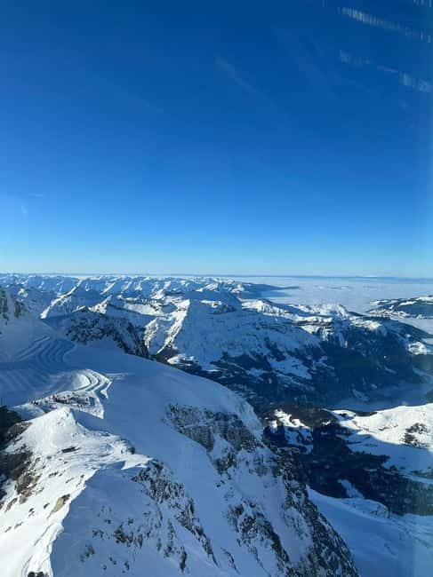 From Zurich: Jungfraujoch Day Trip with Cable Car and Train - Taking the Eiger Express Cable Car to the Jungfraujoch