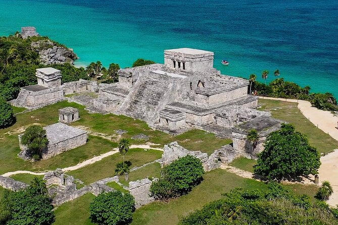 Full Day Tour of Coba and Tulum with Cenote Swim and Lunch - Visiting Tulum: The Coastal Maya Ruins
