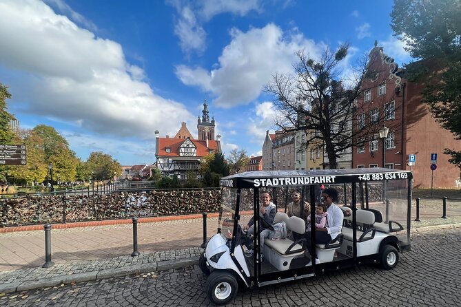 Gdansk: 2H City Sightseeing Tour LIVE GUIDED by Buggy/Golf cart - Exploring Gdansks Iconic Neptunes Fountain and Main Town Hall