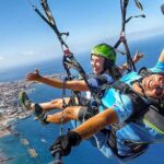 GOLD paragliding flight including videos/photos, t-shirt and a bottle of Cava - The High-Comfort Experience: What’s Included in the Package