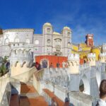Group to Pena Palace, Sintra (pass by Regaleira) and Cascais - Visiting Pena Palace’s Vibrant Facades and Fascinating Myths