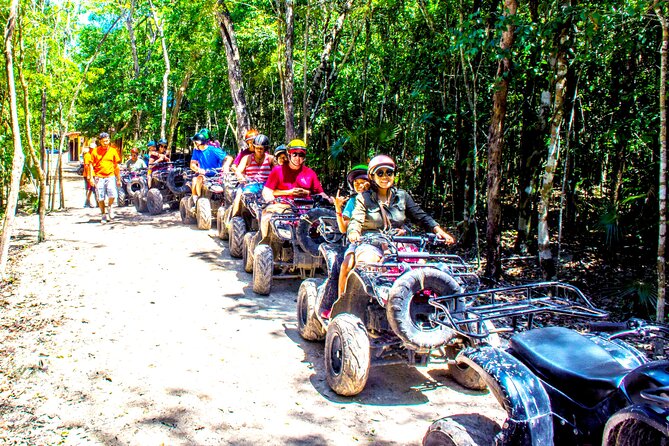 Half Day ATV, Zip-line & Cenote tour! Transportation from Cancun - Ziplining Across the Jungle Treetops