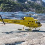Helicopter to a Dogsledding Experience with a Glacier Landing - Exploring the Lower Herbert Glacier and Ice Formations