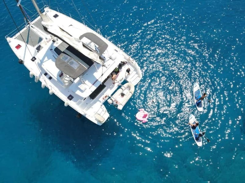 Heraklion: Dia Island Catamaran Trip with Sunset, Meal & Bar - Boarding at Heraklion Marina: Arrival Tips and Meeting Point