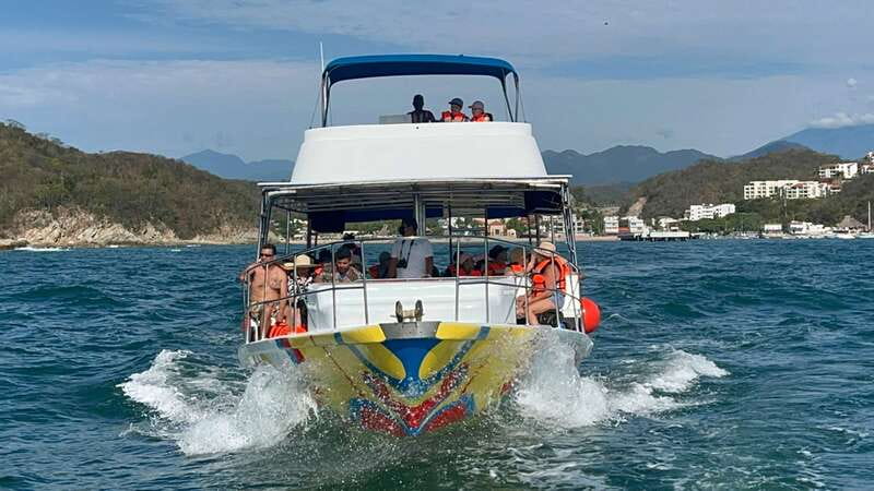 Huatulco: Premium Boat Tour with snorkel experience. - Exploring Chachacual Bay’s Calm Waters and Marine Life