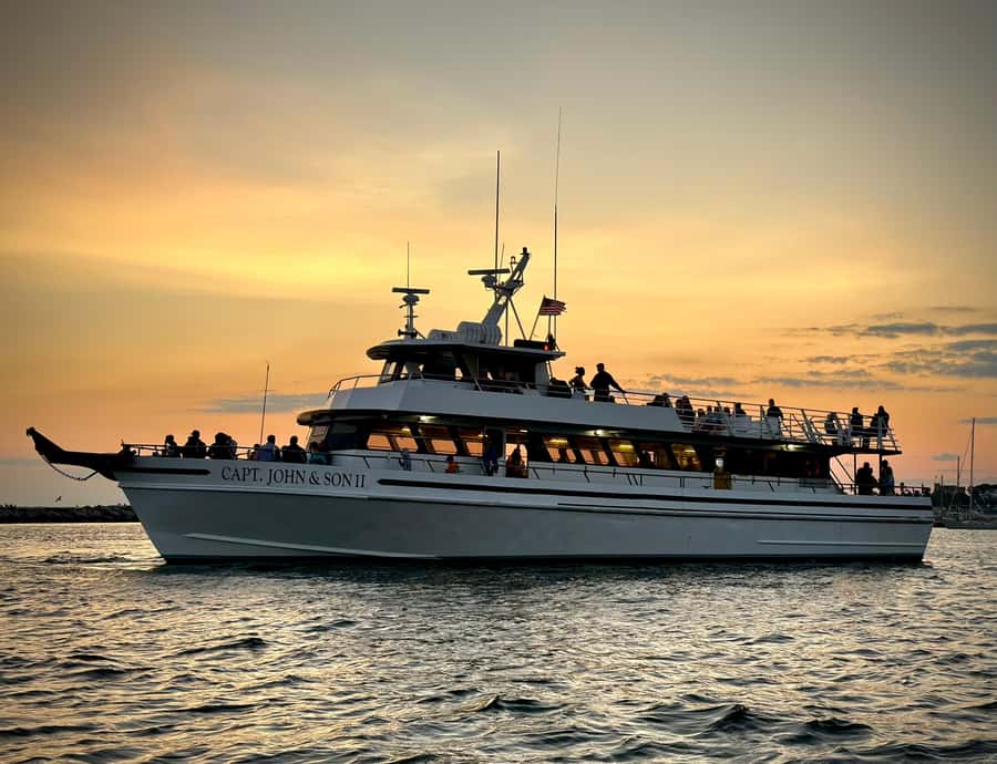 Hyannis: Hyannis Harbor Sunset Cruise - Experience on the Water: Calm Waters and Soft Music