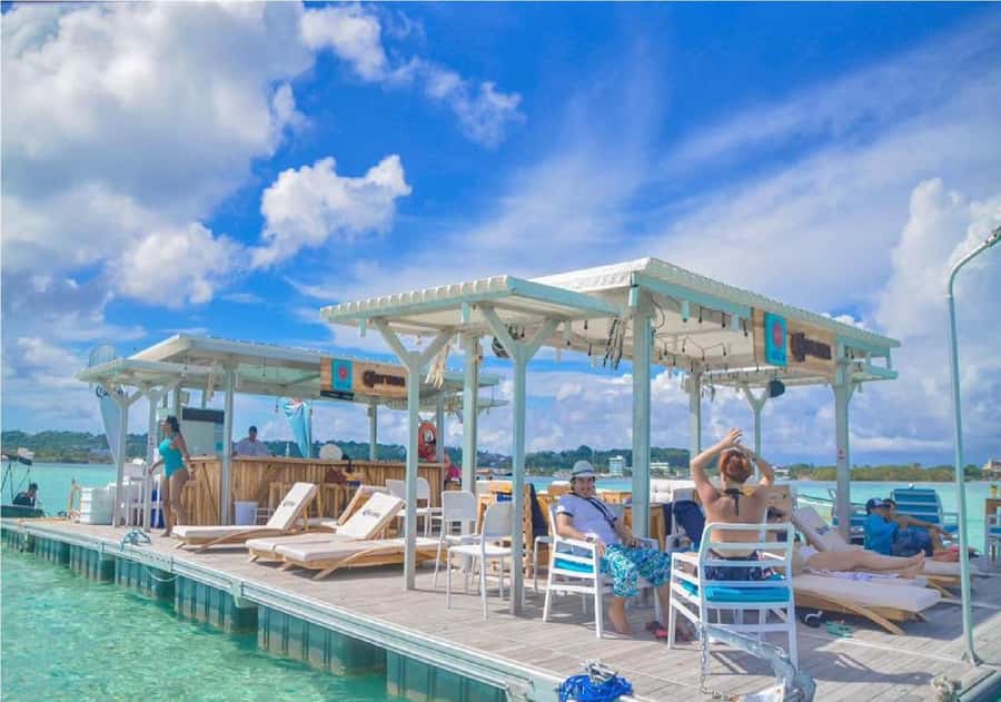 Ibiza Floating Bar Island Tour in San Andres with DJ and Live Music - Starting the Party at the Floating Bar Island in San Andrés