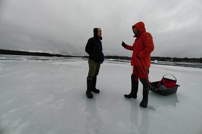 Ice fishing experience with Backpacker Helsinki Tour - The Experience on Lake Bodom: From Ice to Grill