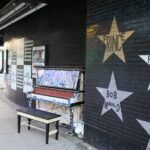 In the Footsteps of Prince: A Self-Guided Audio Tour of Downtown Minneapolis - The Significance of the Crystal Court Balcony in Purple Rain