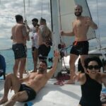 Isla Mujeres Catamaran Party Cruise with Snorkeling and Lunch - The Lively Atmosphere on a Luxury Catamaran in Cancun