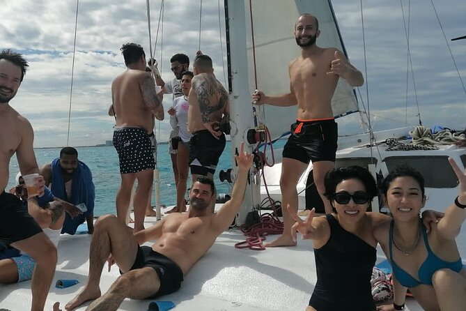 Isla Mujeres Catamaran Party Cruise with Snorkeling and Lunch - The Lively Atmosphere on a Luxury Catamaran in Cancun