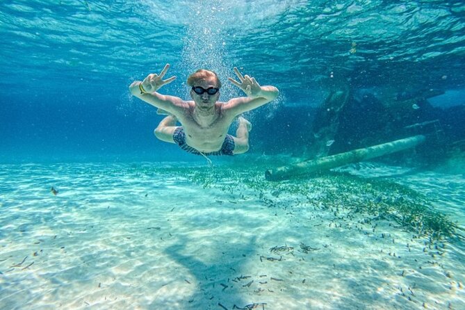 Isla Mujeres Catamaran Tour with Snorkeling, Open Bar and Buffet - A Thrilling Spinnaker Ride for Adventure Seekers