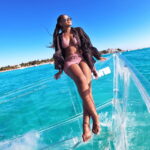 Isla Mujeres: Clear Boat Ride - Navigating the Coastline of Isla Mujeres on a Clear Boat