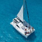 Isla Mujeres Day Tour with Catamaran, Snorkeling & Beach Club - Snorkeling at Bahia Mujeres Reef and Underwater Museum