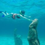 Isla Mujeres Full-Day Catamaran Tour  Buffet, Open Bar & Pickup - Pickup and Departure from Cancun