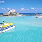 Isla Mujeres, Snorkel, Lunch & Pick Up from Cancun to P.Morelos - Scenic departure from Punta Sam on a trimaran