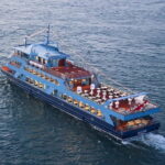 Istanbul: Bosphorus Dinner Cruise & Turkish Night Show - Boarding a Modern Vessel with Indoor and Outdoor Seating