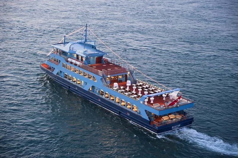 Istanbul: Bosphorus Dinner Cruise & Turkish Night Show - Boarding a Modern Vessel with Indoor and Outdoor Seating