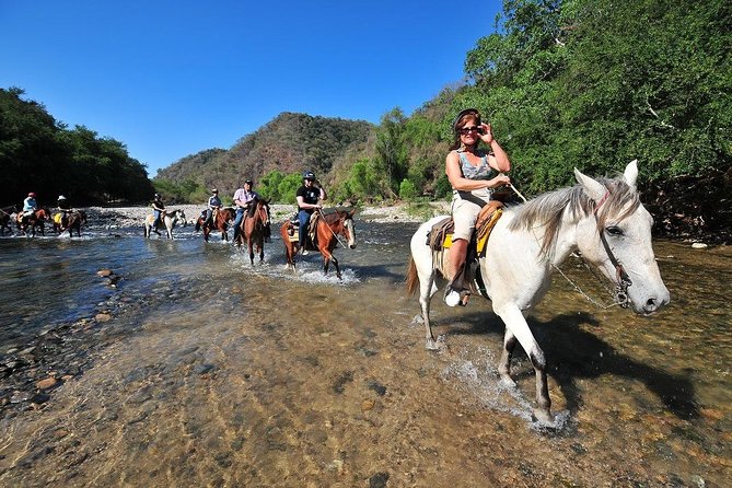 Jungle HorseBack Adventure to Las Palmas Waterfall All Included - The Itinerary: From Old Neighborhoods to Waterfall Views