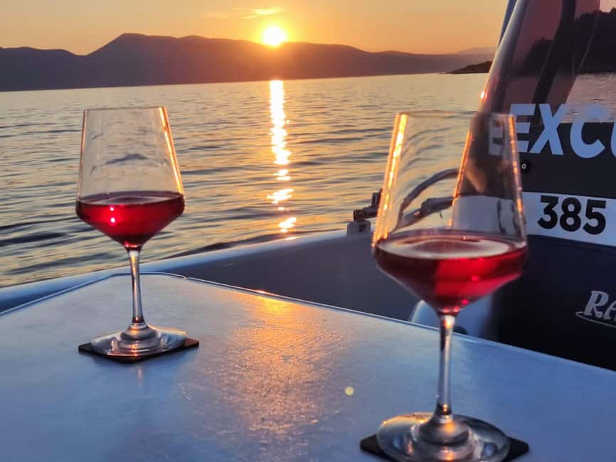 Krk: Sunset Boat Tour with wine, high chance of dolphins - Key Points