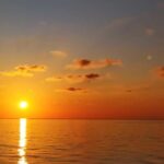 Lefkada: Sunset Cruise with Swimming &Local Wine in Meganisi - Setting Sail on a Scenic Ionian Sea Journey